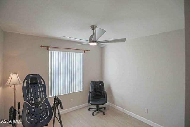 sitting room with ceiling fan, light hardwood / wood-style floors, and plenty of natural light