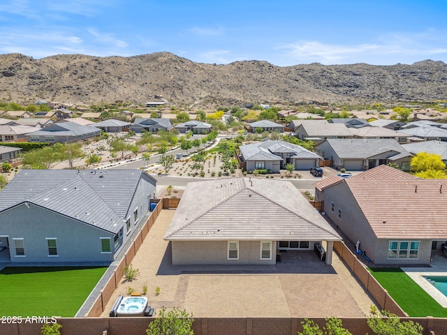 drone / aerial view with a residential view and a mountain view