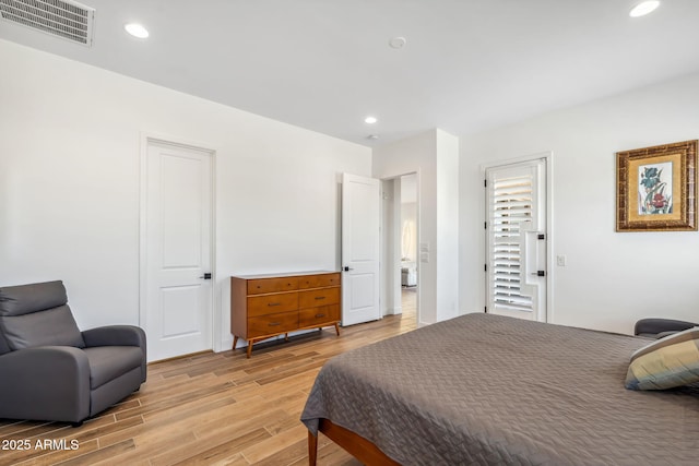 bedroom with visible vents, recessed lighting, and light wood-type flooring