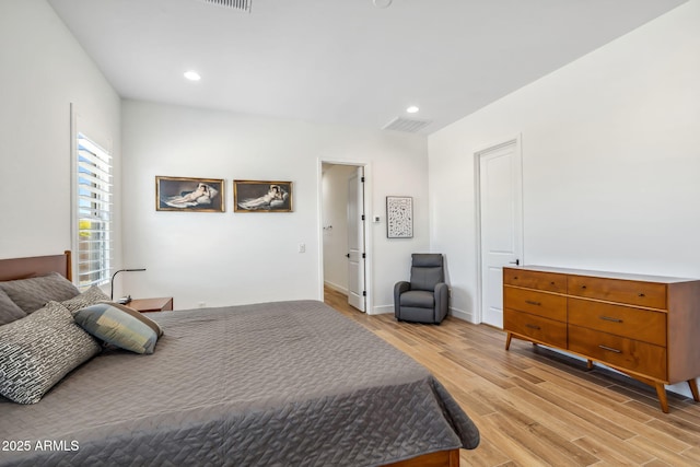 bedroom featuring recessed lighting, baseboards, visible vents, and light wood finished floors