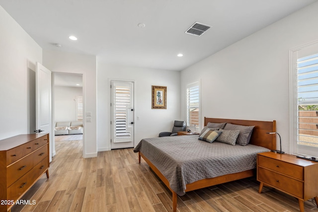 bedroom with recessed lighting, baseboards, visible vents, and light wood-style floors