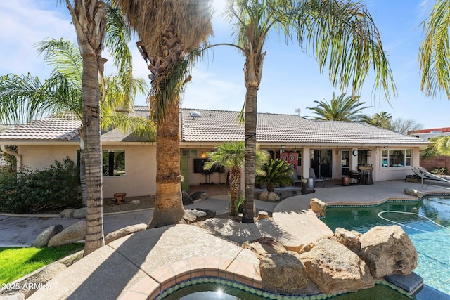 view of pool featuring a patio area