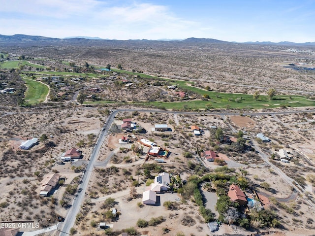 birds eye view of property featuring a mountain view