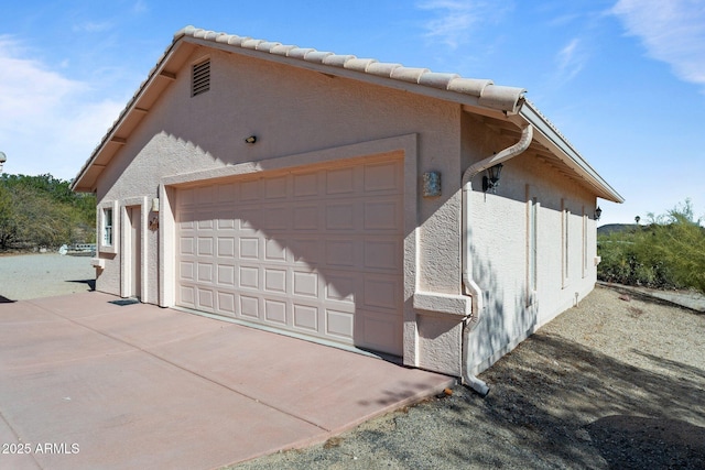 view of home's exterior featuring a garage