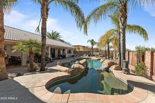 view of swimming pool featuring a patio