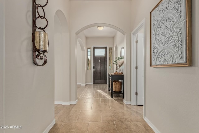 hallway with light tile patterned flooring