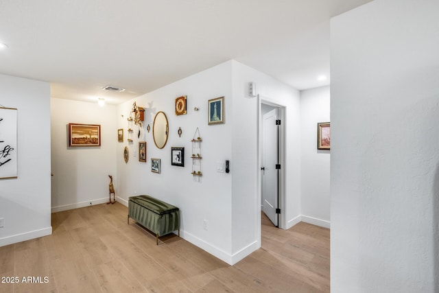 9005 W Villa Chula St, Peoria, AZ 85383 - hall featuring light wood-style floors, baseboards, and recessed lighting