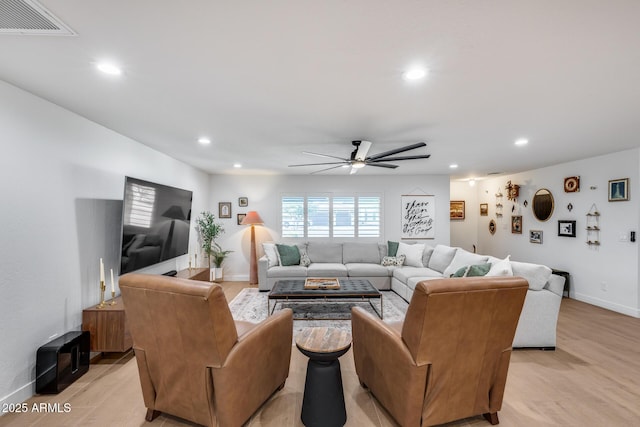 9005 W Villa Chula St, Peoria, AZ 85383 - living room with ceiling fan, recessed lighting, baseboards, and light wood-style flooring
