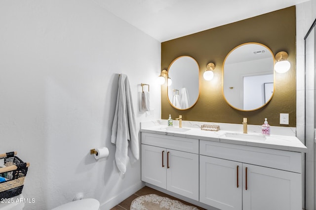 9005 W Villa Chula St, Peoria, AZ 85383 - bathroom with double vanity and tile patterned flooring