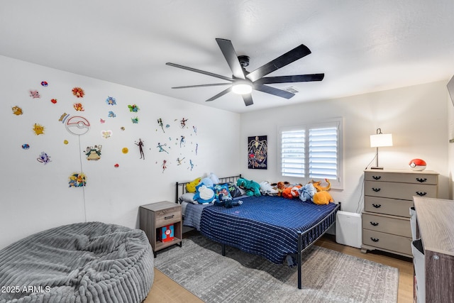 9005 W Villa Chula St, Peoria, AZ 85383 - bedroom featuring light wood-style flooring and a ceiling fan