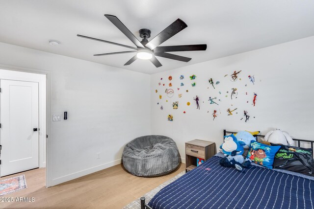 9005 W Villa Chula St, Peoria, AZ 85383 - bedroom featuring light wood finished floors, baseboards, and ceiling fan