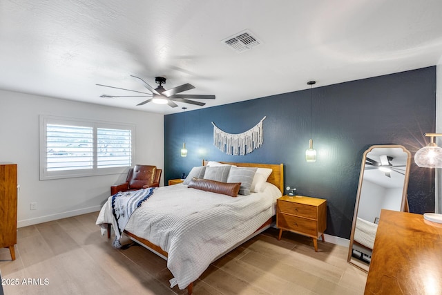 9005 W Villa Chula St, Peoria, AZ 85383 - bedroom featuring light wood-type flooring, baseboards, and ceiling fan