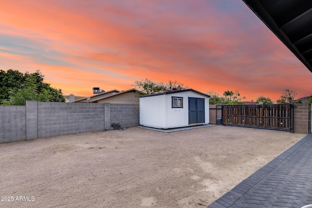 9005 W Villa Chula St, Peoria, AZ 85383 - garage with a shed and a gate