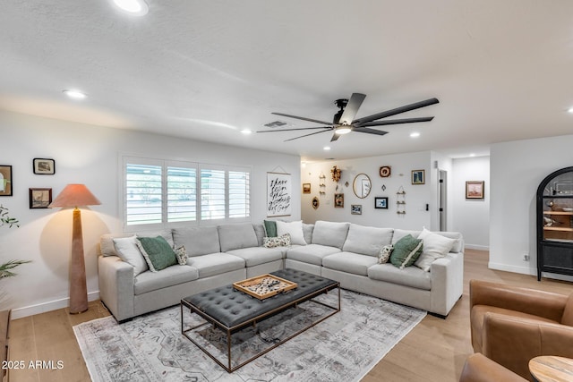 9005 W Villa Chula St, Peoria, AZ 85383 - living room featuring recessed lighting, ceiling fan, light wood-style flooring, and baseboards