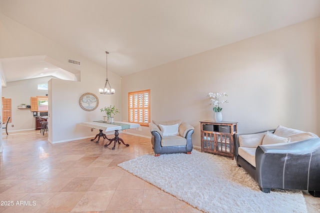 3597 W Mineral Butte Dr, San Tan Valley, AZ 85144 - living area with plenty of natural light, a chandelier, and vaulted ceiling