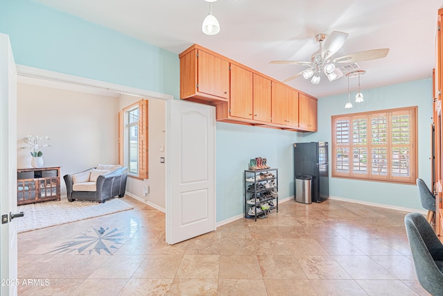 3597 W Mineral Butte Dr, San Tan Valley, AZ 85144 - kitchen featuring a ceiling fan, open floor plan, decorative light fixtures, and light tile patterned flooring