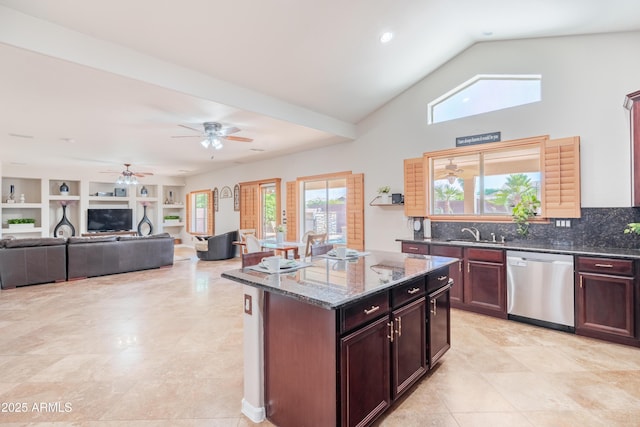 3597 W Mineral Butte Dr, San Tan Valley, AZ 85144 - kitchen featuring dishwasher, dark stone counters, ceiling fan, decorative backsplash, and a center island