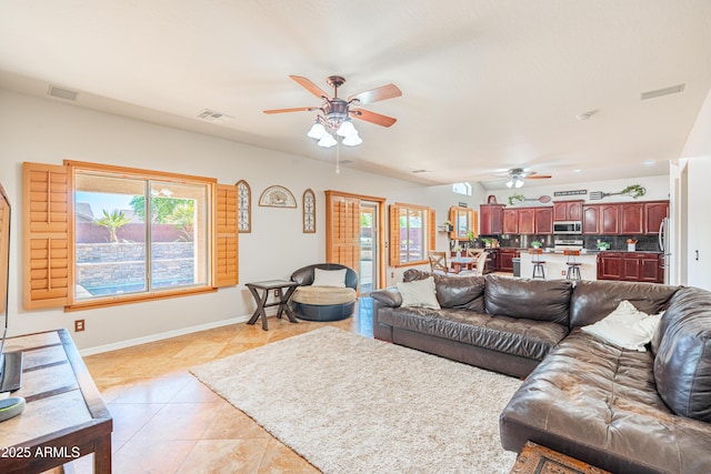 3597 W Mineral Butte Dr, San Tan Valley, AZ 85144 - living room with ceiling fan, light tile patterned flooring, and plenty of natural light