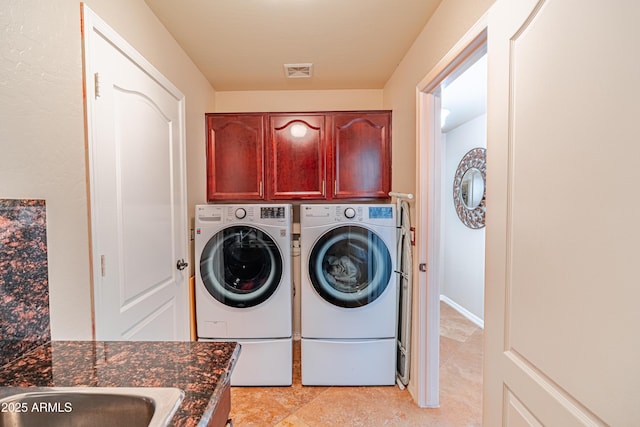 3597 W Mineral Butte Dr, San Tan Valley, AZ 85144 - laundry area with washing machine and clothes dryer and cabinet space