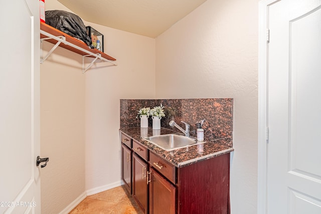 3597 W Mineral Butte Dr, San Tan Valley, AZ 85144 - bar area with a sink and baseboards