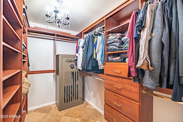3597 W Mineral Butte Dr, San Tan Valley, AZ 85144 - spacious closet with a chandelier
