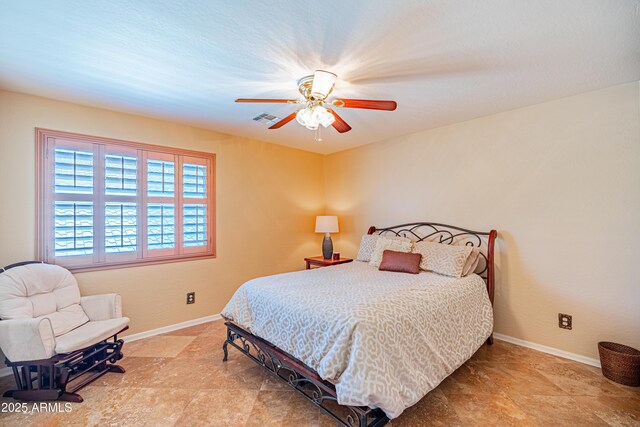 3597 W Mineral Butte Dr, San Tan Valley, AZ 85144 - bedroom featuring baseboards and a ceiling fan