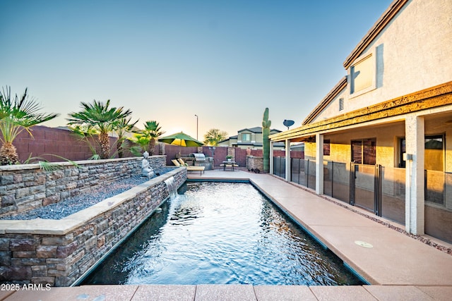 3597 W Mineral Butte Dr, San Tan Valley, AZ 85144 - view of swimming pool featuring a fenced backyard and a patio area