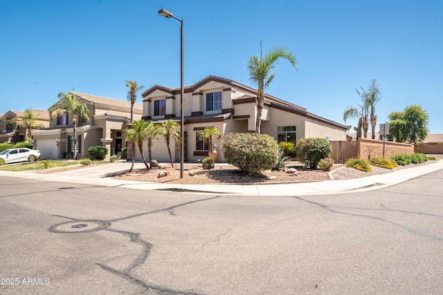 3597 W Mineral Butte Dr, San Tan Valley, AZ 85144 - townhome / multi-family property with stucco siding, a garage, and concrete driveway