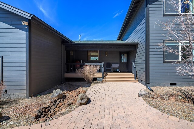 8203 W Roundup Trl, Flagstaff, AZ 86001 - entrance to property featuring covered porch