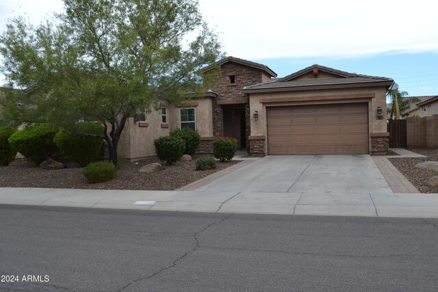 view of front of property with a garage