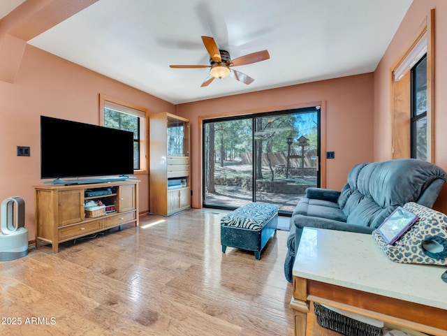 951 N Sky View St, Flagstaff, AZ 86004 - living area with light wood-style floors, healthy amount of natural light, and a ceiling fan