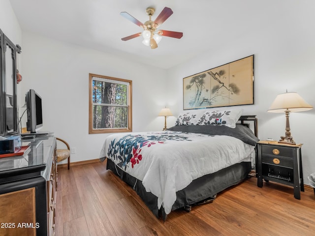 951 N Sky View St, Flagstaff, AZ 86004 - bedroom featuring wood finished floors, baseboards, and a ceiling fan