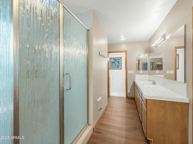 951 N Sky View St, Flagstaff, AZ 86004 - full bathroom featuring wood finished floors, vanity, and a shower stall