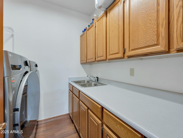 951 N Sky View St, Flagstaff, AZ 86004 - laundry area with separate washer and dryer, cabinet space, and wood finished floors