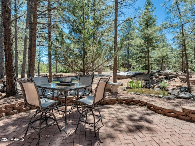 951 N Sky View St, Flagstaff, AZ 86004 - view of patio with outdoor dining space