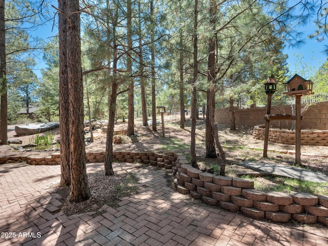 951 N Sky View St, Flagstaff, AZ 86004 - view of patio featuring fence