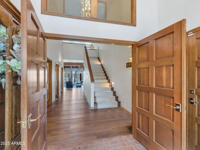 951 N Sky View St, Flagstaff, AZ 86004 - foyer entrance featuring stairs, baseboards, and wood finished floors