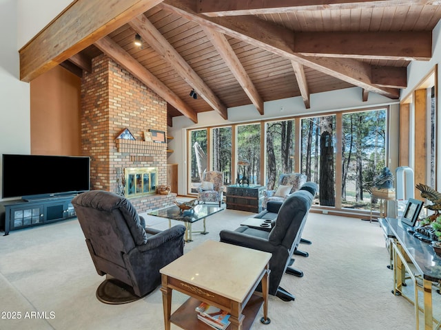 951 N Sky View St, Flagstaff, AZ 86004 - living room with carpet flooring, wooden ceiling, beam ceiling, a brick fireplace, and plenty of natural light