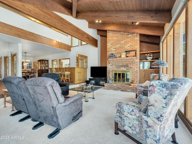 951 N Sky View St, Flagstaff, AZ 86004 - carpeted living area featuring a fireplace and wooden ceiling