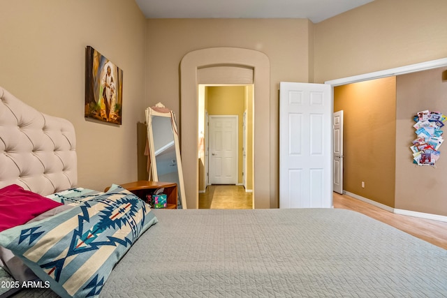 bedroom with light hardwood / wood-style floors