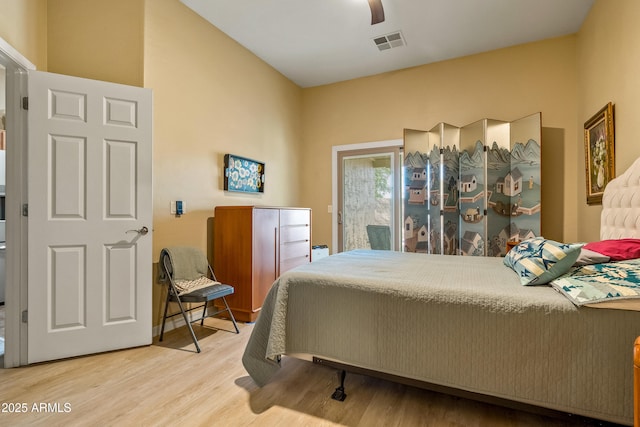 bedroom featuring hardwood / wood-style flooring and ceiling fan