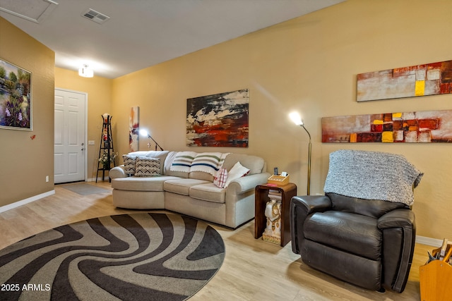 living room with light hardwood / wood-style flooring