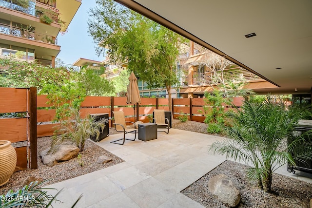 view of patio with fence