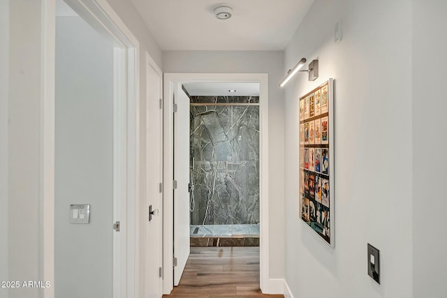 hall featuring wood finished floors