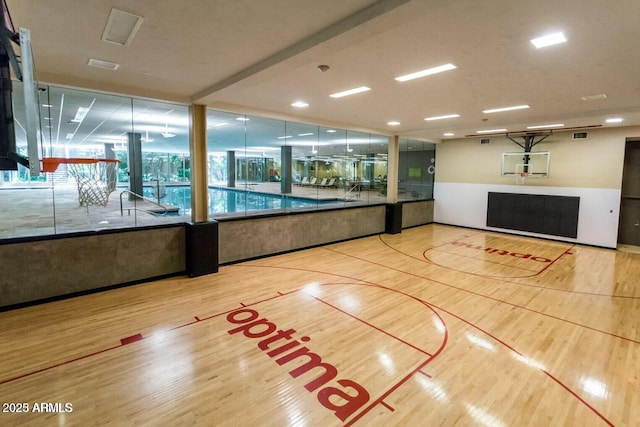 view of basketball court featuring community basketball court