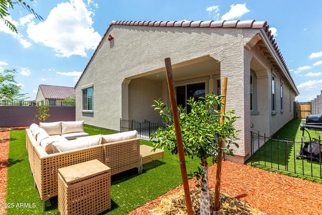 10223 W Piccadilly Rd, Avondale, AZ 85392 - rear view of house featuring an outdoor hangout area and stucco siding