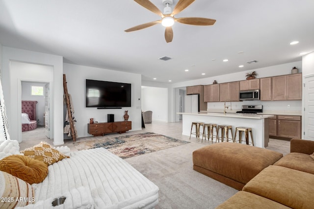 10223 W Piccadilly Rd, Avondale, AZ 85392 - living area featuring ceiling fan and recessed lighting