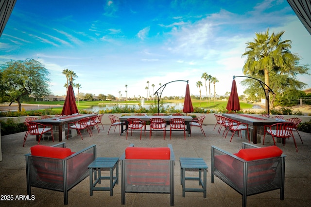 view of patio / terrace with a water view