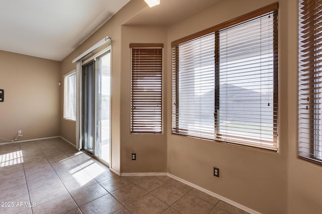 view of tiled spare room