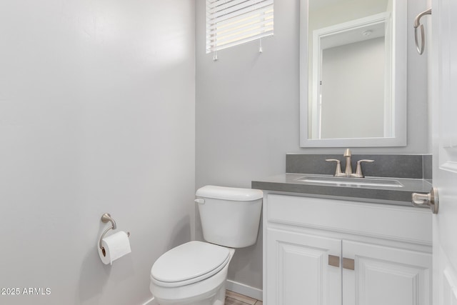 1848 S Follett Way, Gilbert, AZ 85295 - half bath featuring toilet, vanity, and baseboards